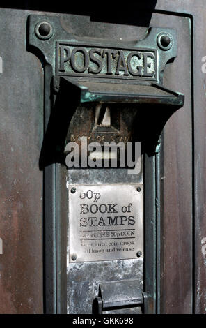 Disused stamp book machine, UK Stock Photo