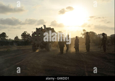 Ugandan soldiers, belonging to the African Union Mission in Somalia, stand at an AU base in Janaale, Somalia, on March 21 ahead of an offensive currently being planned on the nearby town of Qoryooley. AU UN IST PHOTO / Tobin Jones Stock Photo