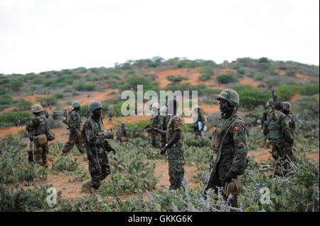 Soldiers belonging to the African Union Mission in Somalia, stand on top of a hill overlooking the Al Shabab stronghold of Barawe in the Lower Shabelle region of Somalia on October 5. The African Union forces, as well as the Somali National Army, are aiming to liberate the town from the extremist group Al Shabab in an operation named Indian Ocean within the next couple of days. AMISOM Photo / Tobin Jones Stock Photo