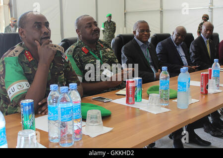 From left to right, Acting AMISOM Force Commander Maj. Gen. Jonathan Rono (first), the Uganda AMISOM contingent commander Brig. Sam Kavuma (second), the Special Representative of the Chairperson of the African Union Commission Ambassador Maman Sidikou (third), the UN Deputy Special Representative for Somalia Raisedon Zenenga (fourth) and Uganda's Ambassador to Somalia Maj. Gen. Nathan Mugisha attend a luncheon at Halane AMISOM base camp, to celebrate Tarehe Sita in Somalia on Saturday. The Uganda Peoples Defense Forces (UPDF) contingent in Somalia commemorated the 34th anniversary of Tarehe Si Stock Photo