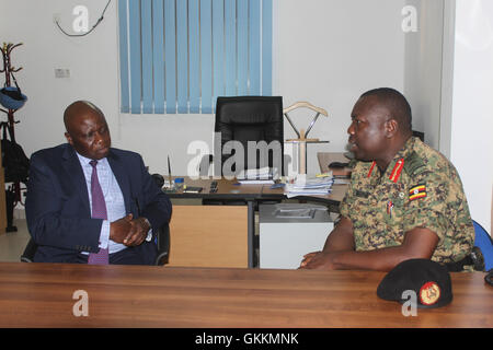 Uganda’s Deputy Chief of Defense Forces (D/CDF) and Inspector General of UPDF Lt Gen. Charles Angina meets the Deputy Special Representative of the United Nations Secretary-General for Somalia (DSRSG) Raisedon Zenenga in Mogadishu, Somalia on August 27 2015.  Gen. Charles Angina has visited and inspected troops, key installations and grounds of tactical importance to the UPDF troops serving under AMISOM and United Nations Guard Unit in Somalia. AMISOM Photo Stock Photo