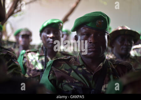 Soldiers belonging to the African Union Mission in Somalia listen to AMISOM Force Commander, Lt. Gen. Jonathan Rono, during a visit by him to Kismayo, Somalia, on December 10. AMISOM Photo Stock Photo