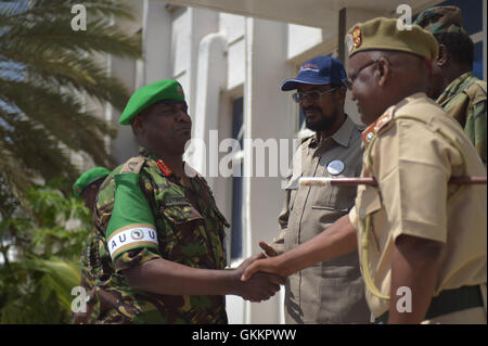 AMISOM Force Commander, Lt. Gen. Jonathan Rono, shakes hands with members of the Interim Jubbaland Administration during a visit to Kismayo, Somalia, on December 10. AMISOM Photo Stock Photo