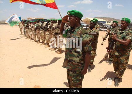 Soldiers from the Ethiopian and Djiboutian contigents of the African Union Mission in Somalia (AMISOM) on parade at Beletweyne Airport, awaiting the arrival of Somali President H.E Hassan Sheikh Mohamud who was in Beletweyne for negotiations on the federal state formation for Hiiran and Middle Shabelle regions, on Friday 25 March 2016. AMISOM Photo / Abdulkadir Ahmed Stock Photo