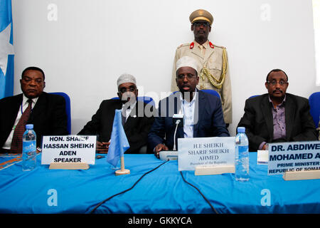 Mogadishu, Somalia 05/09/2011 -  President Sheikh Sharif Sheikh Ahmed of Somalia addresses delegates at the UNPOS (United Nations Political Office of Somalia) Consultative meeting in Mogadishu (L to R) Ambassador Augustine Mahiga, Special Representative to the Secretary General, Sharif Hassan Sheikh Aden, Speaker of the Somali Parliament, President Sheikh Sharif Sheikh,Dr Abdiweli Mohamed Ali, Prime Minister of Somalia  Ahmed. Stock Photo