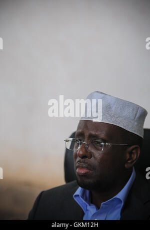 SOMALIA, Balad: In a photograph taken 01 August and released by the African Union-United Nations Information Support team 02 August, Somali President Sheik Sharif Sheik Ahmed listens during a meeting with traditional elders and leaders in Balad town, Middle Shabelle region approx. 40km north east of the capital Mogadishu. Balad was until recently, under the control of the Al-Qaeda-affliated terrorist group Al Shabaab until an offensive by the Somali National Army (SNA) supported by the African Union Mission in Somalia (AMISOM) forces on 26 June drove out the extremists, liberating the town and Stock Photo