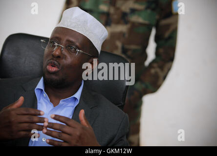 SOMALIA, Balad: In a photograph taken 01 August and released by the African Union-United Nations Information Support team 02 August, Somali President Sheik Sharif Sheik Ahmed gestures during a meeting with traditional elders and leaders in Balad town, Middle Shabelle region approx. 40km north east of the capital Mogadishu. Balad was until recently, under the control of the Al-Qaeda-affliated terrorist group Al Shabaab until an offensive by the Somali National Army (SNA) supported by the African Union Mission in Somalia (AMISOM) forces on 26 June drove out the extremists, liberating the town an Stock Photo