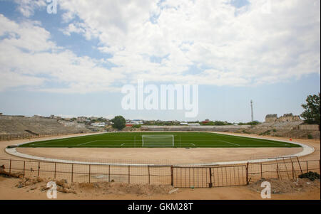 SOMALIA, Mogadishu: A handout photograph dated 12 January and released by the African Union-United Nations Information Support Team 16 January, shows a view of Baanadir Stadium in the Abd-Aziz District of the Somali capital Mogadishu, which has recently been re-surfaced with a new artificial playing surface. Funded by FIFA, the Somali Football Federation has had the 7,500-capacity stadium re-turfed and will soon begin repair work on seats, parking and other facilities that are currently riddled with reminders of Somalia's war-ridden past. After two decades of near-constant conflict, Somalia is Stock Photo