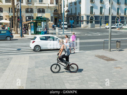 Alicante, Spain - SEPTEMBER 2015: Young man at Square 'Plaza Puerta del Mar' Stock Photo