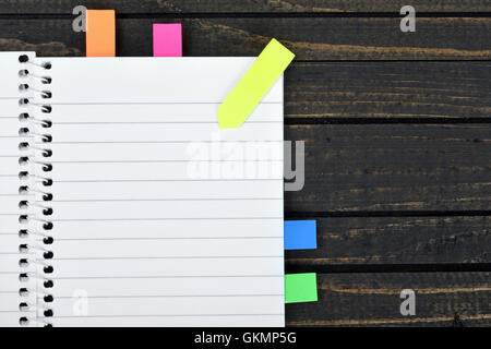 Empty notepad on wooden table Stock Photo
