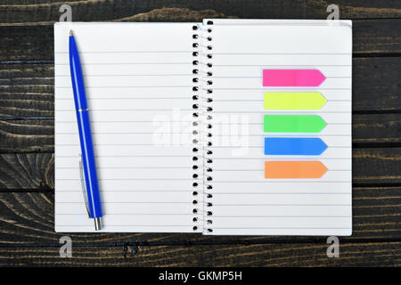 Empty notepad on wooden table Stock Photo