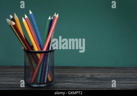 Group of pens on wooden table Stock Photo