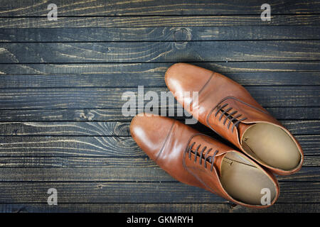 Business shoes on wooden floor Stock Photo