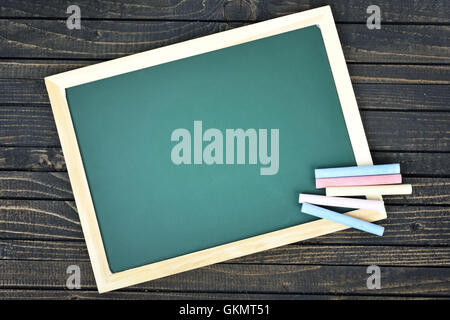 School board on wooden table Stock Photo