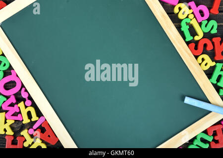 School board on wooden table Stock Photo