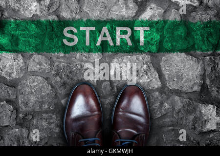 Business man shoes and start word Stock Photo