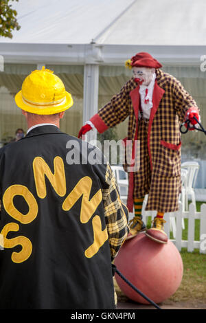 Sonny & Rainbow  entertain the crowds by skipping and walking on a ball.  As two of the funniest clowns around, Gordon Murray and Gary McBeth,  can turn everyday situations into funny scenarios.  The crowds were blown away by their antics as the duo performed in front of a record final day attendance at the showground arena at the 48th annual Southport Flower Show, 2016. Stock Photo