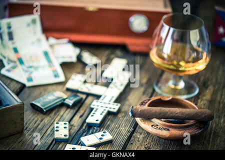 Cuban cigars and traditional domino game Stock Photo - Alamy
