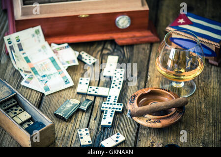 Cuban cigars and traditional domino game Stock Photo - Alamy