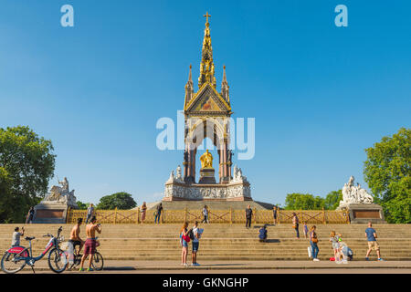 London summer, tourists in summer visit the Albert Memorial in Kensington Gardens, London, UK Stock Photo