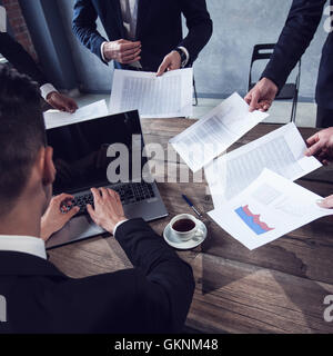 Business man getting extra work deadline concept Stock Photo