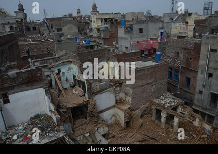 Lahore, Pakistan. 21st Aug, 2016. A view of the old building collapsed near historical Wazir Khan Mosque Dehli gate in Lahore. Five people were killed and eight others injured when the roof of a house caved in during a wedding ceremony in Lahore on Sunday, local media reported. Credit:  Rana Sajid Hussain/Pacific Press/Alamy Live News Stock Photo