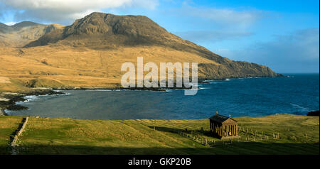 The Bullough Mausoleum and Ruinsival in the Rum Cuillin hills from Harris Bay, Isle of Rum, Scotland, UK. Stock Photo