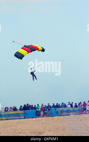 Bournemouth, UK. 21 August 2016. The Tigers Freefall Parachute Team perform at Bournemouth Air Festival 2016 - crowds watch parachutists come into land. Credit:  Carolyn Jenkins/Alamy Live News Stock Photo