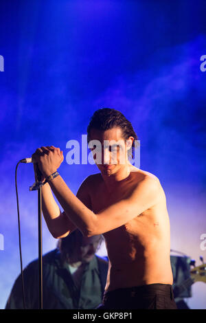 Lias Kaci Saoudi sings with The Moonlandingz (a supergroup containing members of Fat White Family, Eccentronic Research Council and Sean Lennon) play the Far Out Tent on the final day of the Green Man Festival 2016 at the Glanusk Estate in Brecon, Wales, UK on August 21 2016. Picture: Rob Watkins/Alamy Live News Stock Photo