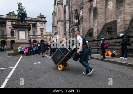 Edinburgh, Scotland. 22nd August, 2016. A performer brings his tools before his show. The Edinburgh Festival Fringe is the largest performing arts festival in the world, this year's festival hosts more than 3000 shows in nearly 300 venues across the city. Credit:  Simone Padovani / Awakening / Alamy Live News Stock Photo