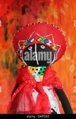 Zulu African unique rag dolls in traditional handmade souvenir beads and fabrics clothes . Craftsmanship. African fashion Local craft stock photo, Stock Photo