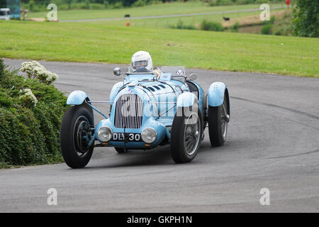 John Guyatt throws his 1936 Talbot-Lago into the roundabout at the 2016 Chateau Impney Hill Climb Stock Photo