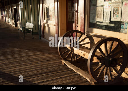 Late afternoon light shines on a wooden walkway in Tombstone, Arizona. Stock Photo