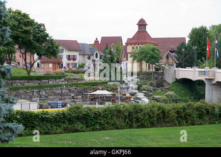 Bavarian style shops in Frankenmuth, Michigan. The bridge at the right crosses the Cass River. Stock Photo