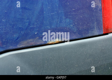 Rust and corrosion on the body of a new car Stock Photo