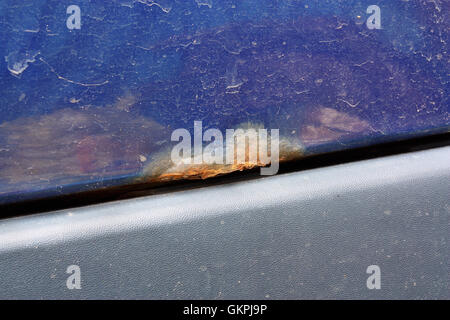 Heavily rust and corrosion on the body of a car Stock Photo