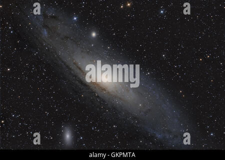 Andromeda Galaxy (M31) and its satellite galaxies (M32 and M110) in Andromeda constellation Stock Photo