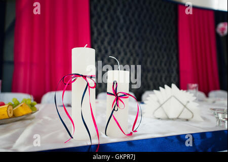 two candles on the table in a restaurant Stock Photo