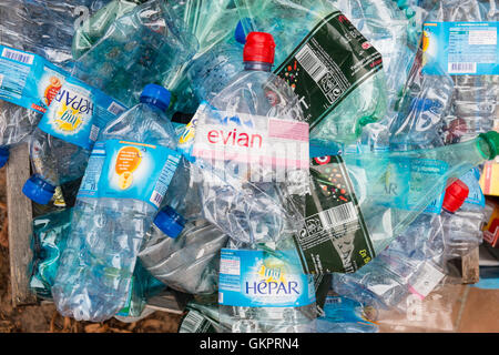 Used plastic water bottles in waste bin for recycling in village of Montazels,Aude Province,South of France. Stock Photo