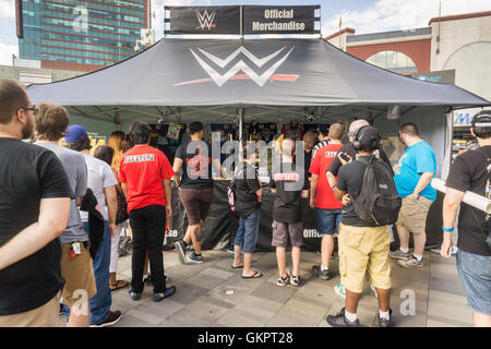 Wrestling fans buy souvenirs and other memorabilia prior to the WWE SummerSlam event at the Barclays Center in Brooklyn in New York on Saturday, August 20, 2016.  (© Richard B. Levine) Stock Photo