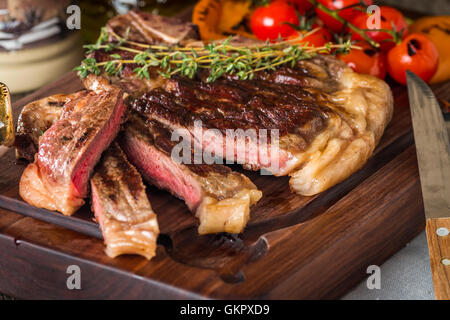 Beef steaks with grilled vegetables and seasoning