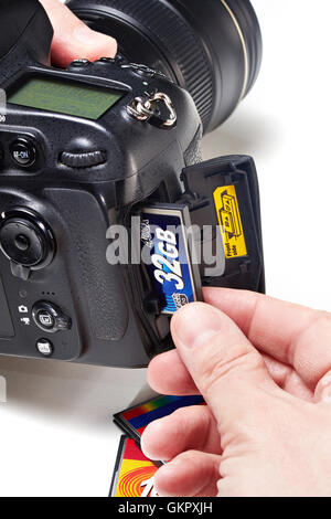 Set flash cards CF in DSLR camera close-up Stock Photo