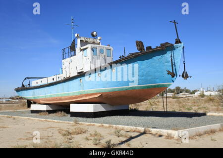 Fishing ship as a memorial in Moynaq near a former fishing port, Uzbekistan. Stock Photo