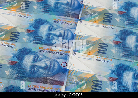 Financial background made of 100 swiss franc Stock Photo