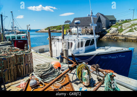 Fishing boat 'Miss Peggy's Cove' tied up at the wharf in Peggy's Cove, Nova Scotia, Canada. Stock Photo