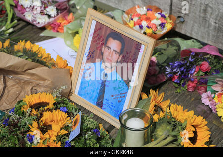 Floral tributes are left at the memorial for victim Tori Johnson, on ...