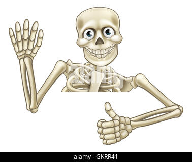 Skeleton Halloween cartoon character peeking over a sign giving a thumbs up Stock Photo