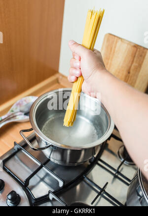 Spaghetti in pan cooking in boiling water Stock Photo