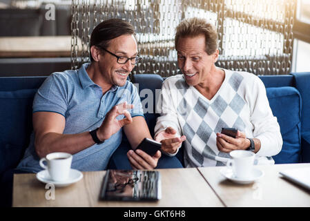 Nice men using smart phones Stock Photo