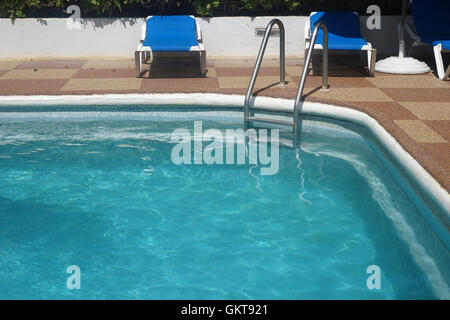 A blue swimming pool at Dover Beach Hotel, Barbados Stock Photo